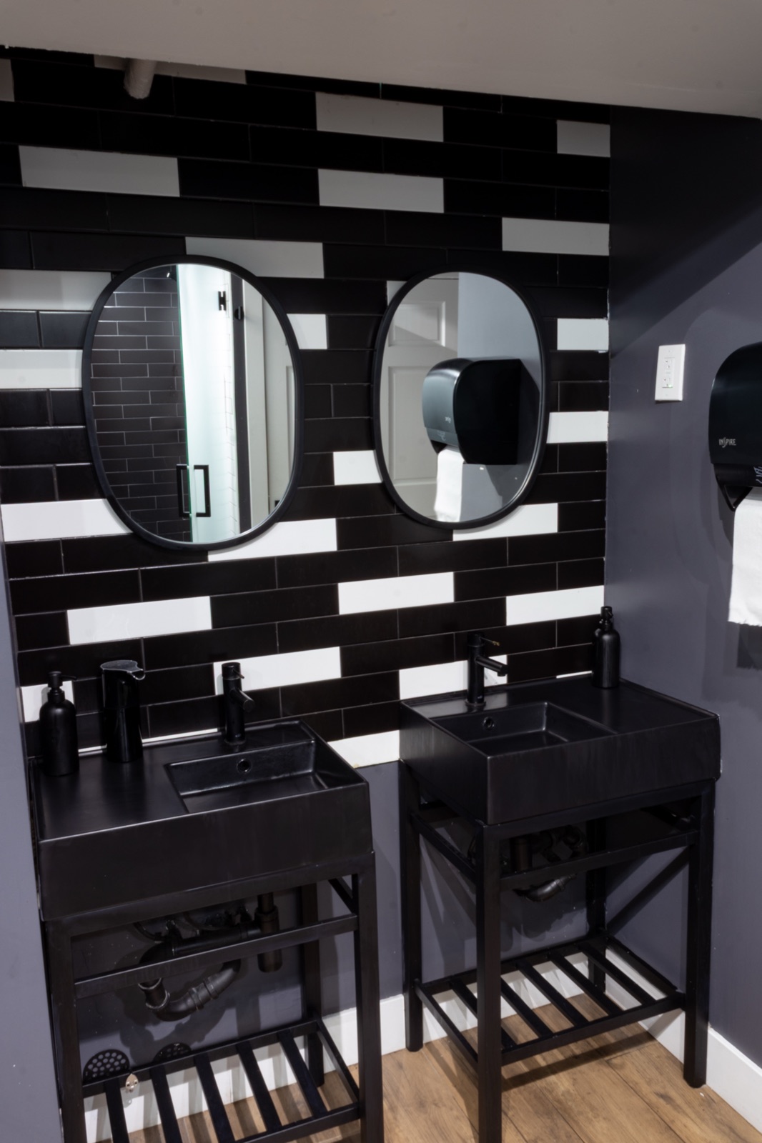 Ladies' locker room — salon station with chairs and vanity mirror